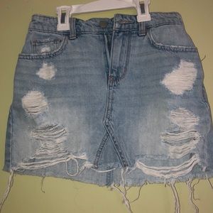 Distressed denim skirt